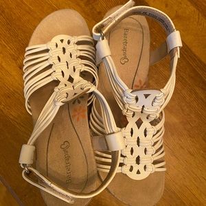 Beautiful white braided wedge sandals.